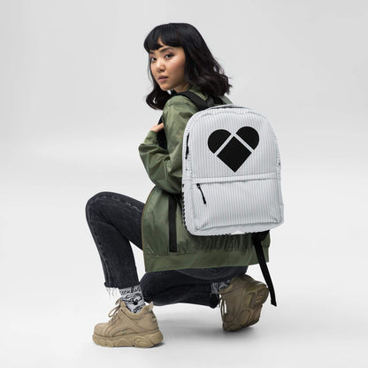 girl with a Fashion-Forward Gray Backpack with Heart Logo by CRiZ AMOR
