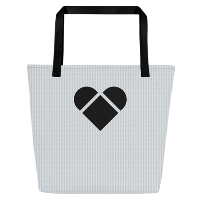 A light gray tote bag with a playful lovogram pattern, with big black heart logo