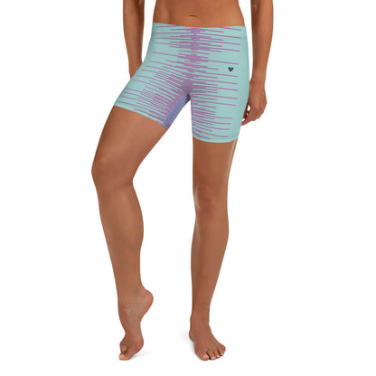Active woman in Mint Dual Leggings Shorts for versatile activewear by CRiZ AMOR