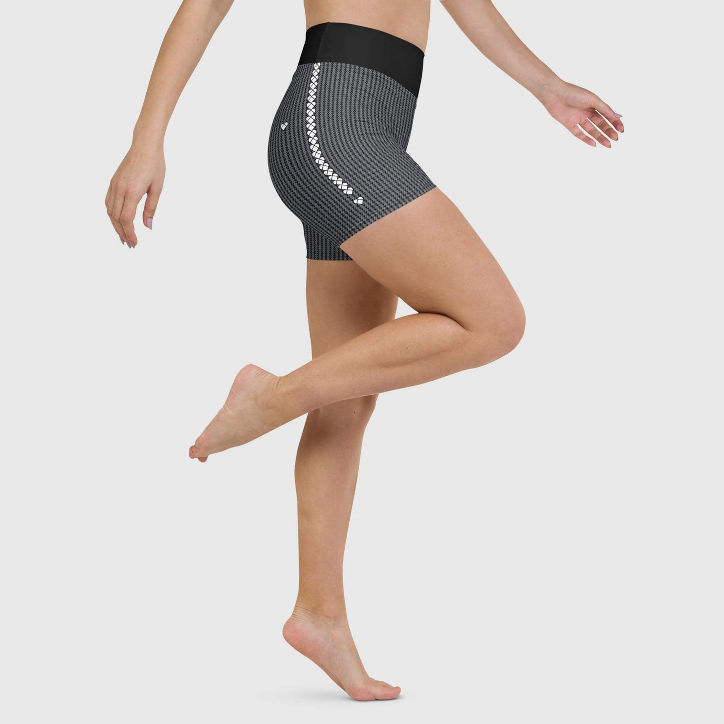 Distinctive logo stripe detail on black raised waistband yoga shorts