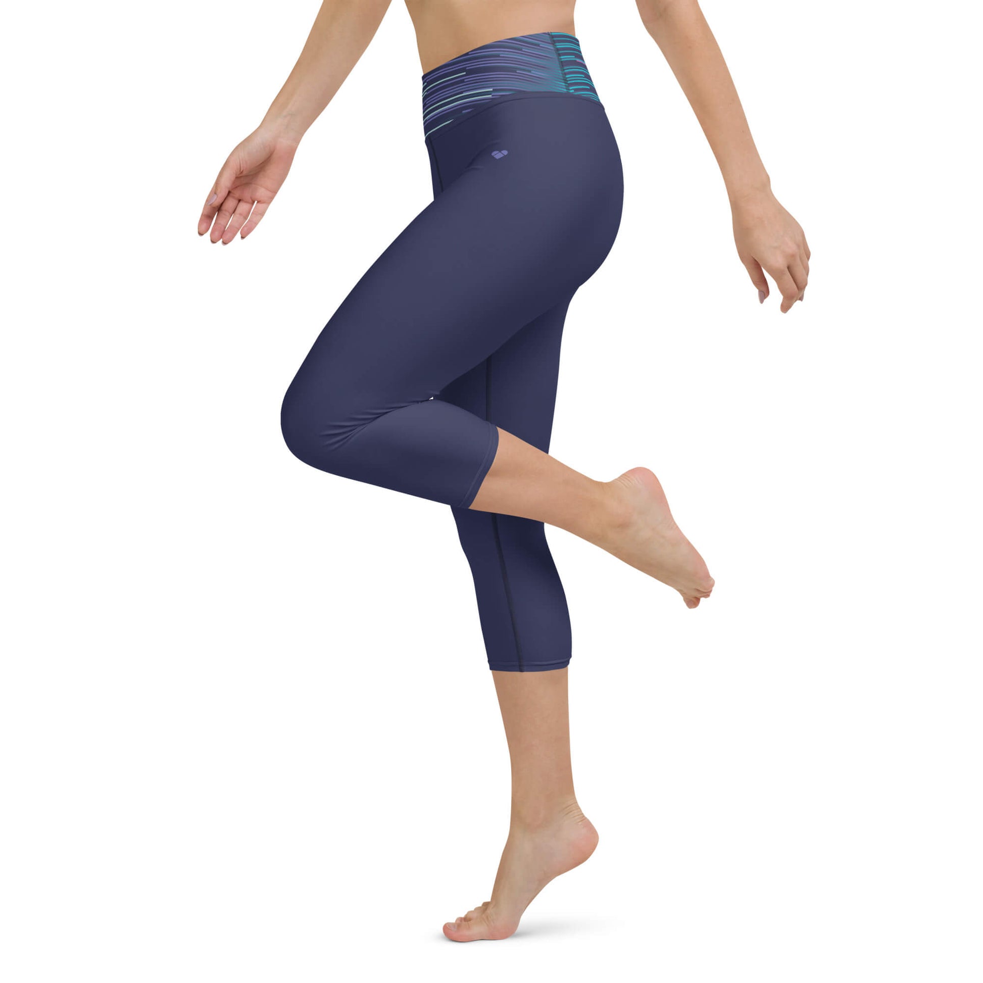 Model wears Dark Slate Blue Dual Yoga Capri Leggings by CRiZ AMOR