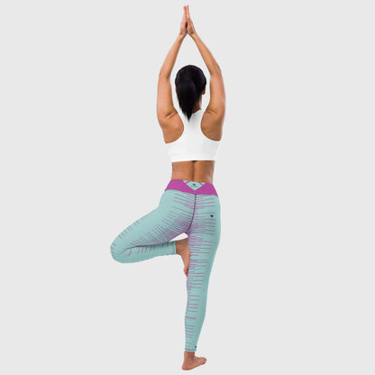 Woman wearing Mint Dual Yoga Leggings in gradient mint and fucsia pink