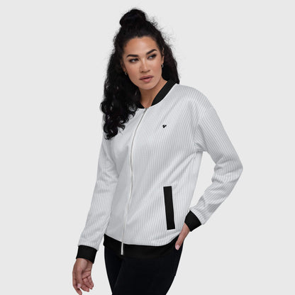 Light Gray Bomber Jacket by CRiZ AMOR, a versatile and stylish jacket with a unique pattern and black heart logo, female model side view