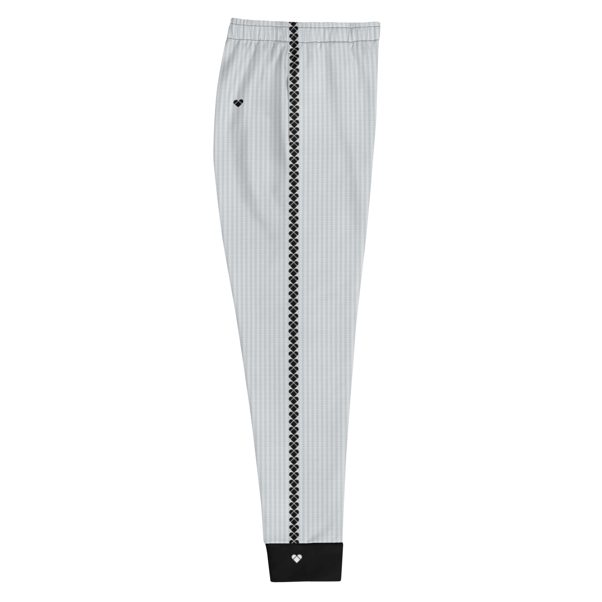 Light gray joggers with a heart-shaped geometric pattern and black details on the leg cuffs for women from CRiZ AMOR's Amor Primero collection, right side