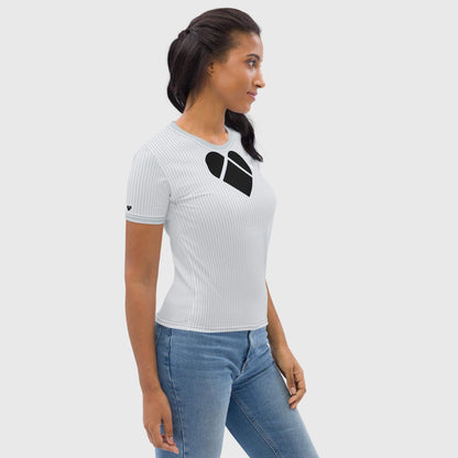 side view of model wearing CRiZ AMOR's Love Armor Shirt for women in light gray, adorned with a black heart made of dual shade lovograms, a pattern of little heart-shaped geometrical logos